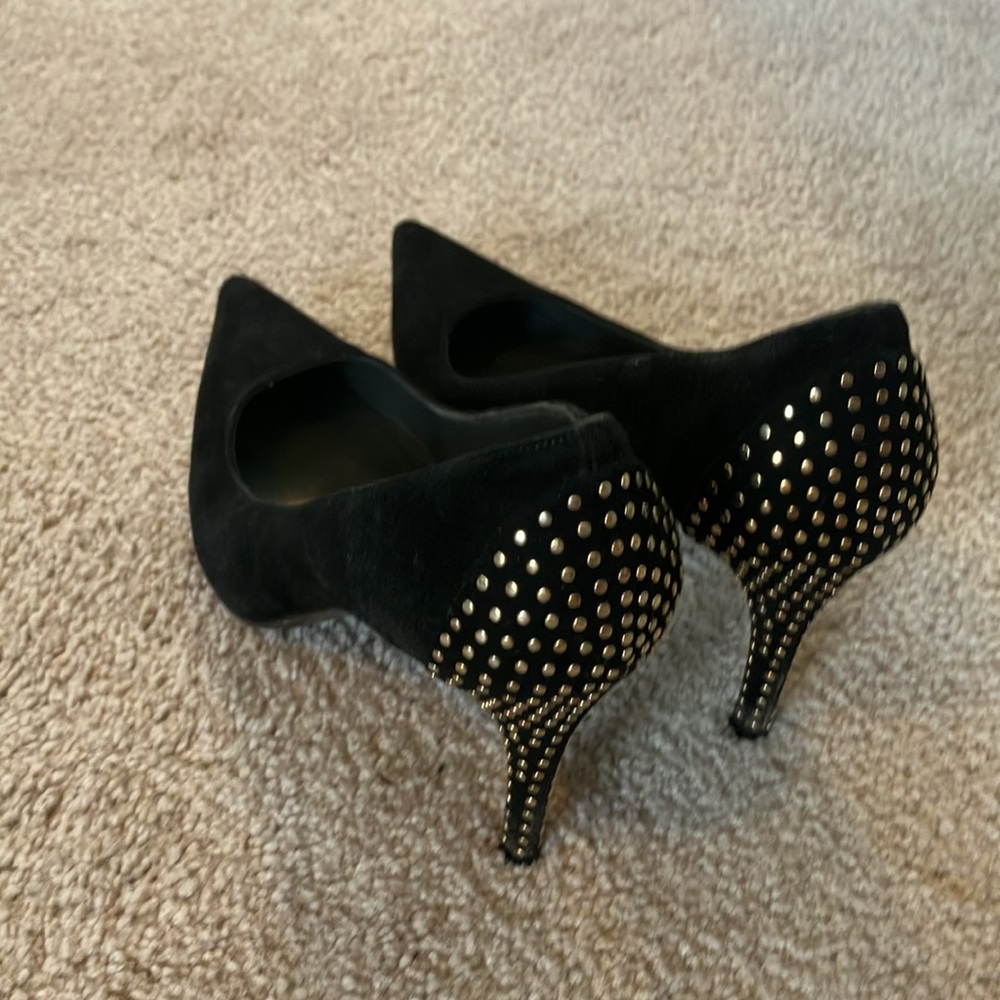 Black velvet pointy toe heels with gold accent